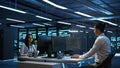 IT professional in server hub establishing performance benchmarks