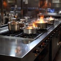 Professional setup Stove in the restaurant kitchen with stainless steel pots Royalty Free Stock Photo