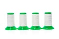 Professional sewing threads on a green industrial roll.