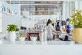 Professional shakers and ingredients for making mojitos - ice cubes, mint leaves, lime on the white bar table with blurred barman Royalty Free Stock Photo