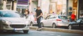 Professional skater riding skate on streets through cars and traffic