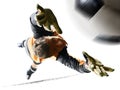 Professional soccer goalkeeper in action on white background