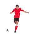 Professional soccer player kicking ball Royalty Free Stock Photo