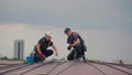 Professional steeplejacks are working on the dome roof