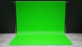 Professional studio empty green screen setup 3D render. Vignette version. Royalty Free Stock Photo
