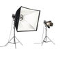 Professional studio lighting setup with large softbox and spotlight on stands in studio environment Royalty Free Stock Photo