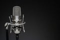 Professional, studio microphone on a black background. Is isolated.Can be used for audio, karaoke and music content Royalty Free Stock Photo