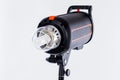 Professional studio strobe photo flash light. Royalty Free Stock Photo