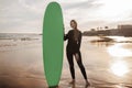 Professional Surfer Lady Standing On The Beach And Holding Surf Board Royalty Free Stock Photo