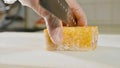 Professional sushi chef preparing roll at commercial kitchen, close-up. Royalty Free Stock Photo