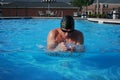 Professional swimmer performing breaststroke