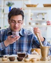 Professional tea expert trying new brews Royalty Free Stock Photo