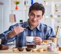 Professional tea expert trying new brews Royalty Free Stock Photo