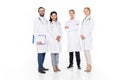 full length view of professional male and female doctors smiling at camera