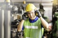 Professional technicians wear protective equipment and hard hats in large industrial plants. Protective and Safety Equipment eye Royalty Free Stock Photo