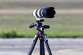 Professional telephoto lens for DSLR camera on the tripod Royalty Free Stock Photo