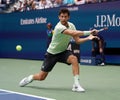 Professional tennis player  Dominic Thiem of Austria in action during his 2019 US Open first round match Royalty Free Stock Photo