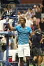 Professional tennis player Gael Monfis of France celebrates victory after his US Open 2016 quarterfinal match Royalty Free Stock Photo
