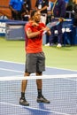 Professional tennis player Gael Monfis of France celebrates victory after his 2019 US Open second round match Royalty Free Stock Photo