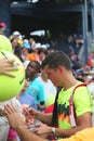 Professional tennis player Miols Raonic signing autographs after third round match at US Open 2014 Royalty Free Stock Photo