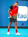 Professional tennis player Nick Kyrgios of Australia in action during his 2022 Miami Open round of 32 match Royalty Free Stock Photo