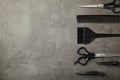 Professional tools for hair dyeing on grey background, flat lay. Space for text Royalty Free Stock Photo