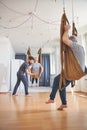 Professional trainer instructing a woman during the workout