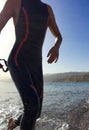 Professional triathlete practicing in open water. Swimming in se Royalty Free Stock Photo