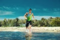 Professional triathlete swimming in river`s open water