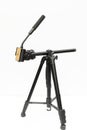 Professional tripod with fluid head for multi angle video shooting and photography Royalty Free Stock Photo