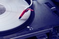 Professional turntable playing vinyl record Royalty Free Stock Photo