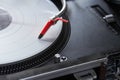 Professional turntable playing vinyl record Royalty Free Stock Photo