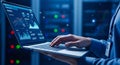 IT Professional Typing on Laptop with Analytics Dashboard in Server Room Royalty Free Stock Photo