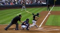 Professional umpire, catcher, and batter at work Royalty Free Stock Photo