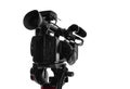 Professional video camera on tripod isolated on white background Royalty Free Stock Photo