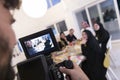 Professional videograph recording video while Muslim family having iftar together during Ramadan Royalty Free Stock Photo