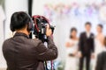 Professional videographer recording wedding ceremony day Royalty Free Stock Photo