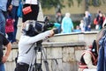 professional videographer shoots on video camera a City Day in Gatchina, Leningrad Region Russia.