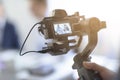 Professional videomaker shooting a video Royalty Free Stock Photo