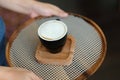 Professional waiter is serving cup of coffee Royalty Free Stock Photo