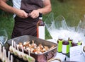 Professional waiter uncorking a bottle of red wine Royalty Free Stock Photo