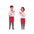 Professional waiters couple holding bottles of wine man woman restaurant workers in red apron offering alcohol drinks Royalty Free Stock Photo