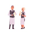 Professional waiters couple polishing wine glasses with towel man woman restaurant workers in uniform flat full length
