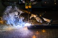 Professional welder man working on metal welding and sparks metal. Royalty Free Stock Photo