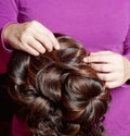 Wig Maker Working in her Workshop. Royalty Free Stock Photo