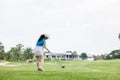 Professional woman golfer practice in golf course Royalty Free Stock Photo