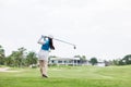 Professional woman golfer practice in golf course Royalty Free Stock Photo