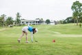 Professional woman golfer practice in golf course Royalty Free Stock Photo