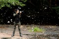 Professional woman photographer taking butterfly in the green jungle rain forest nature. Royalty Free Stock Photo