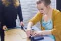 Professional women decorators working with kraft paper